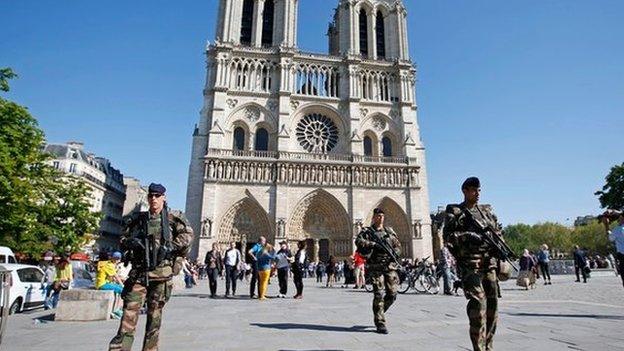 French police patrol outside Notre Dame Cathedral on 22 April 2015