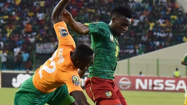 Benjamin Moukandjo (right) in action against Ivory Coast at the Nations Cup