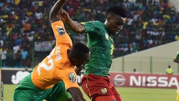 Benjamin Moukandjo (right) in action against Ivory Coast at the Nations Cup