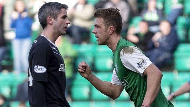 Motherwell's Keith Lasley and Hibs' Jordon Forster