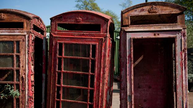 Three derelict phone boxes