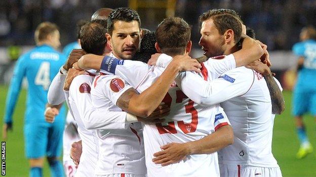 Sevilla players celebrate scoring against Zenit St Petersburg