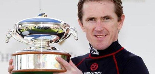 AP McCoy with champion jockey's trophy