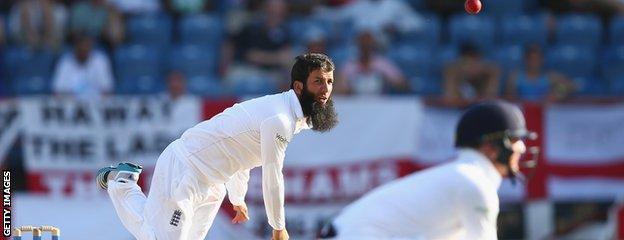 Moeen Ali bowls