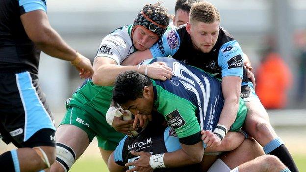 Connacht's Bundee Aki and Eoin McKeon battle with Glasgow's Finn Russell