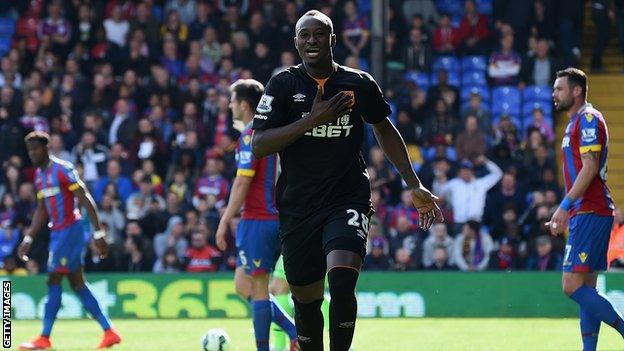 Hull City forward Dame N'Doye celebrates scoring against Crystal Palace