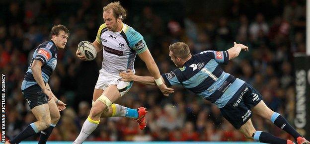 Ospreys lock Alun Wyn Jones powers past Gethin Jenkins of Cardiff Blues to set up Dan Biggar's try