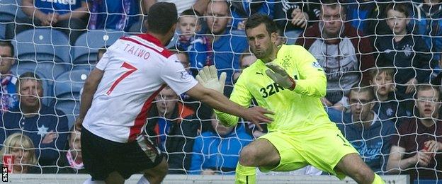 Tom Taiwo scores for Falkirk against Rangers