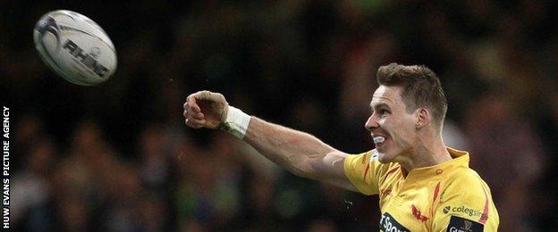 Liam Williams celebrates his try against the Dragons