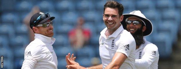 James Anderson celebrates with Ian Bell (left) and Moeen Ali (right)