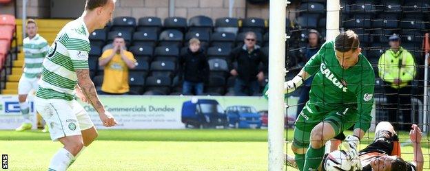 Goalkeeper Radoslaw Cierzniak is unable to prevent Leigh Griffiths' second