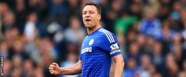 John Terry celebrates Chelsea's draw at Arsenal