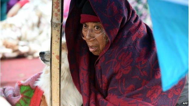 Patient Sanu Ranjitkar at a makeshift outdoor shelter in Kathmandu, Nepal (27 April 2015)