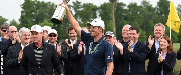 Justin Rose celebrates winning the Zurich Classic of New Orleans