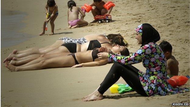 Beachgoers in Byblos