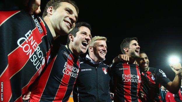 Eddie Howe celebrates with players