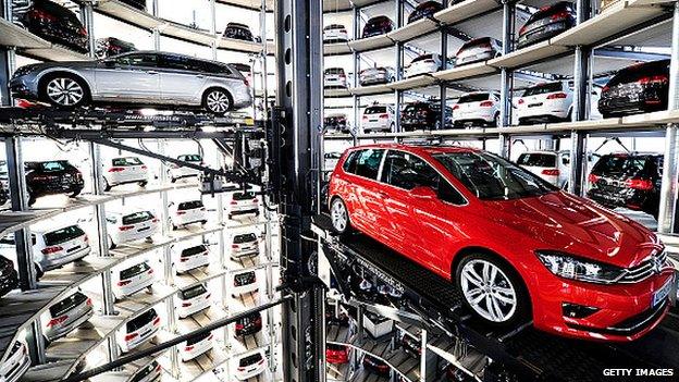 A Volkswagen Passat and Golf 7 car stored in a tower at the Volkswagen Autostadt complex near the Volkswagen factory on March 10, 2015 in Wolfsburg, Germany