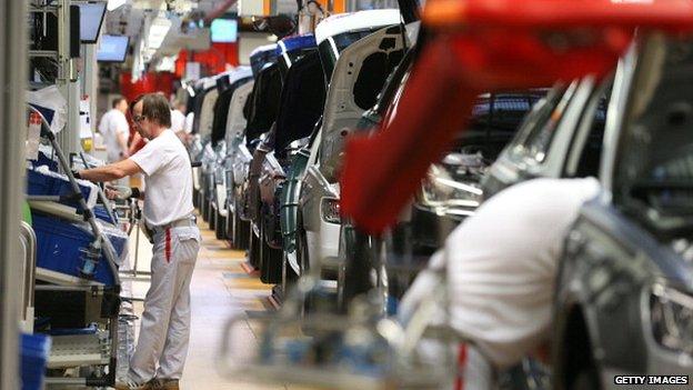 Workers on VW's Audi A3 production line at a factory in Ingolstadt, Germany