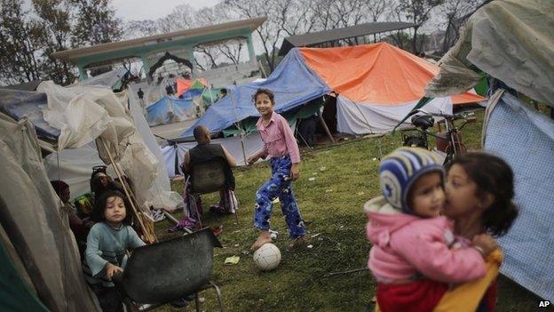 Earthquake survivors in makeshift camp in Kathmandu on 28 April 2014