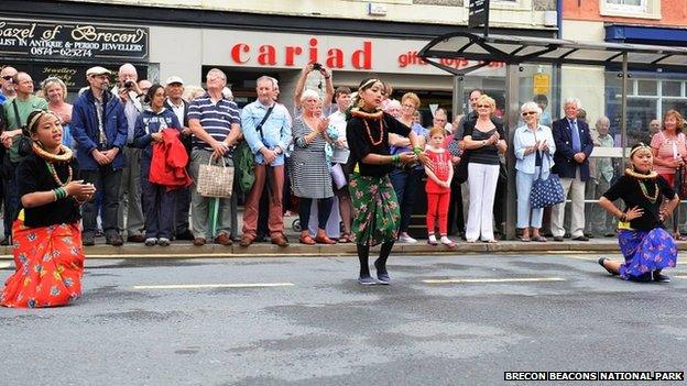 Nepalese dancers taking part in a Brecon Freedom Parade