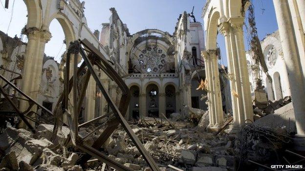 Handout image provided by the United Nations on 16 January 2010, the remains of a cathedral are seen in Port-au-Prince, Haiti.