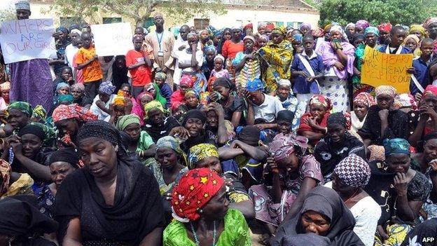Parents of missing Chibok schoolgirls gather on April 14, 2015 to mark the one-year anniversary of the abduction of 219 schoolgirls by Boko Haram Islamists in the northeastern Nigerian city of Chibok in Borno State.