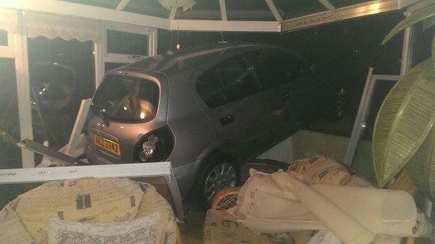 Car in conservatory