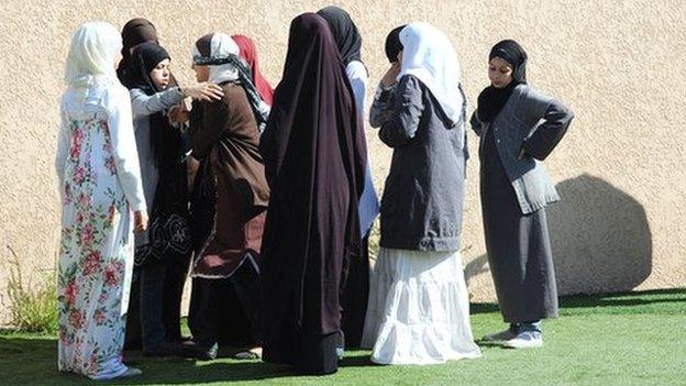 Veiled pupils play in a playground in May 2011 at the Alif private Muslim school in the French city of Toulouse