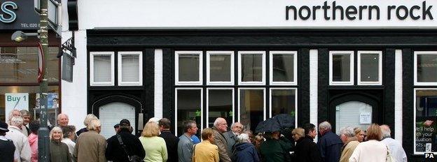 Customers outside a Northern Rock branch in 2007