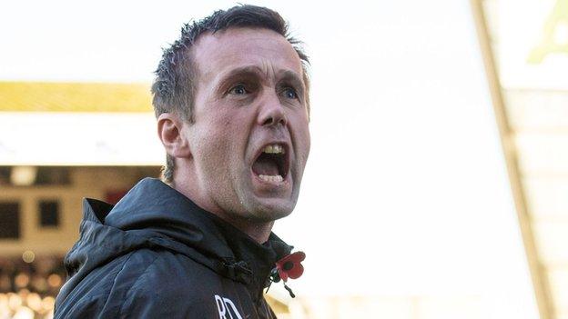 Celtic manager Ronny Deila celebrates at Pittodrie