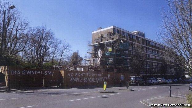 Hoardings where the Carlton Tavern used to be