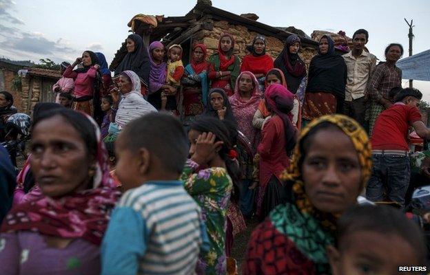 Nepal Muslim villagers gather as they wait for relief supply at Dargaon village in Gorkha, Nepal April 29, 2015