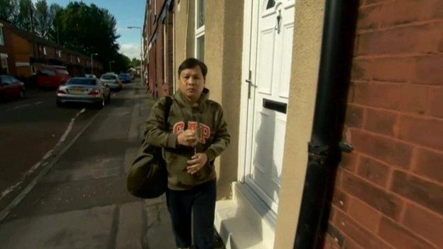 Victorino Chua outside his Stockport home