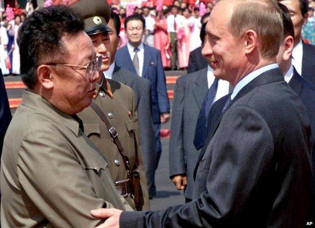 Russian President Vladimir Putin, right shakes hands with North Korean leader Kim Jong-il, on his arrival in Pyongyang, in July 2000