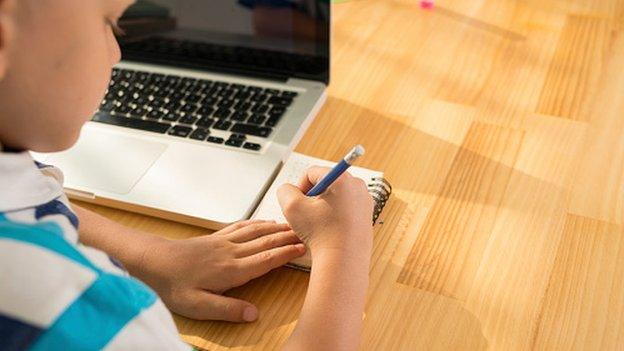 Child with laptop