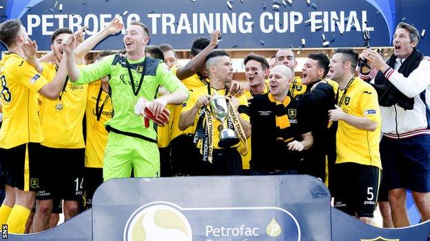 Livingston celebrate winning the Petrofac Training Cup