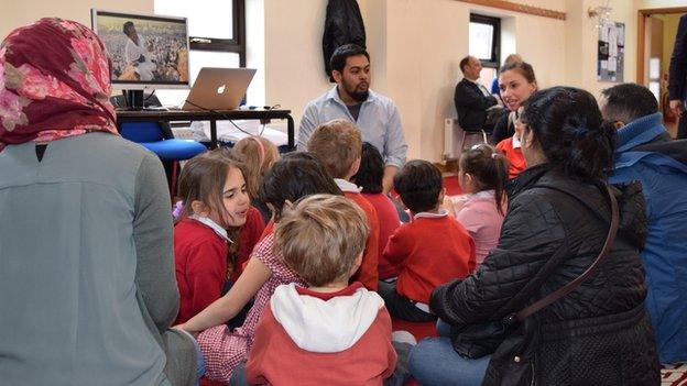 Azim Ahmed talks to school children about pilgrimage