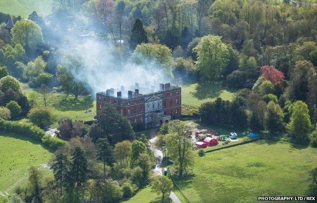 Fire Service still in attendance following fire at National Trust run Clandon Park Clandon Park House gutted by huge fire, Guildford