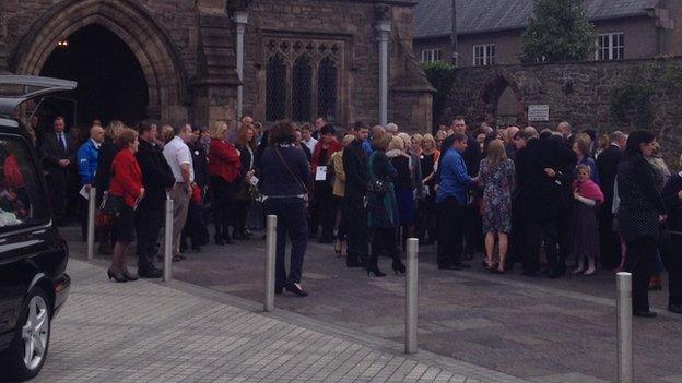 Mourners at St Mary's Church in Abergavenny
