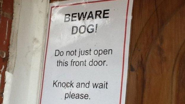 Beware of the dog sign