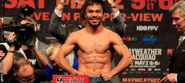 Pacquiao shows off his toned body