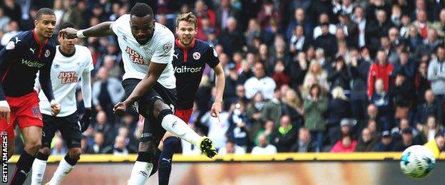 Darren Bent shoots towards goal for Derby against Reading