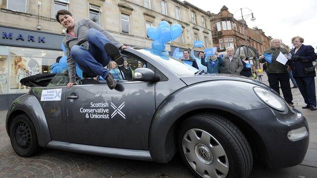 Ruth Davidson jumps out of a car in Hamilton