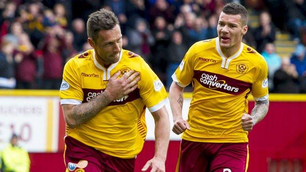 Motherwell's Scott McDonald (left) celebrates scoring his goal with Marvin Johnson