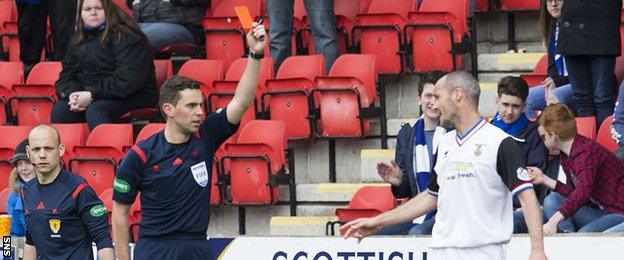 Inverness Caledonian Thistle defender David Raven is shown a red card against St Johnstone