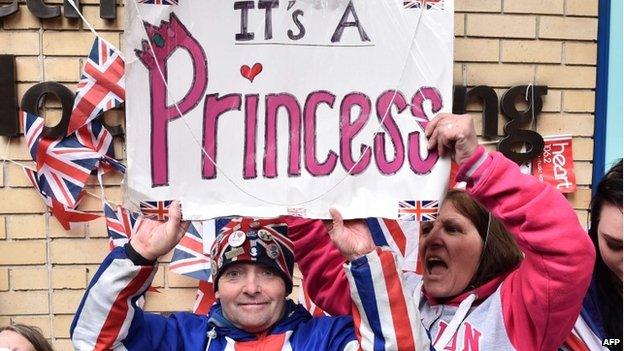 Royal fans celebrate outside St Mary's Hospital