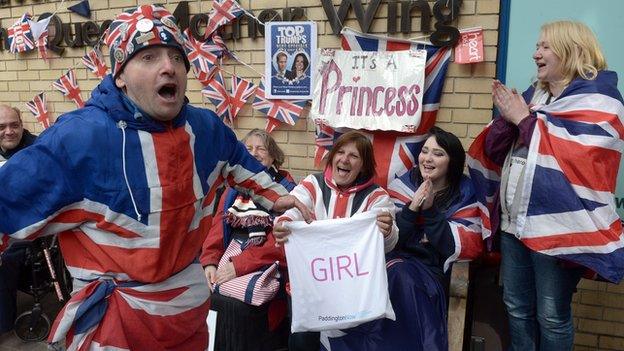 People celebrate outside the Lindo Wing