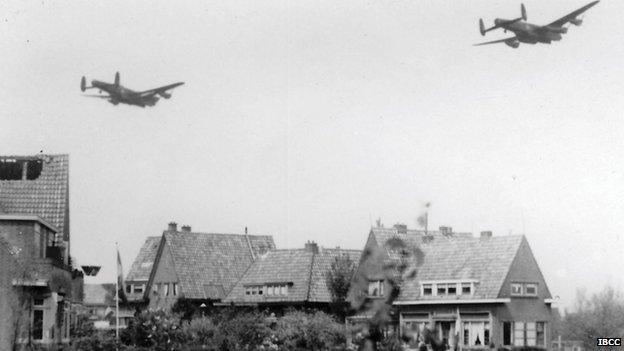 Lancaster flying over Rotterdam