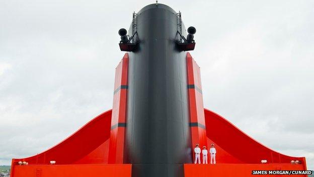 The fleet captains gathered on the funnel of Queen Mary 2