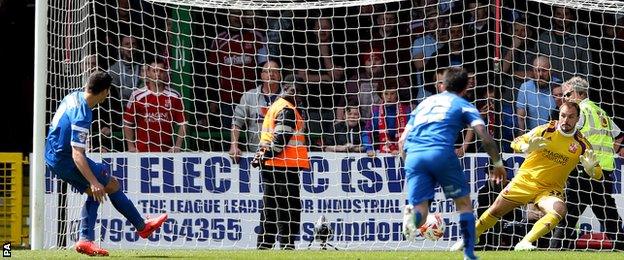 Lloyd James's penalty is saved by Cameron Belford